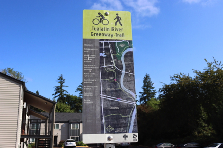 Tualatin River Greenway Trail sign – open sunrise to sunset –  dogs on leash – no alcohol, camping, fires – no vehicles